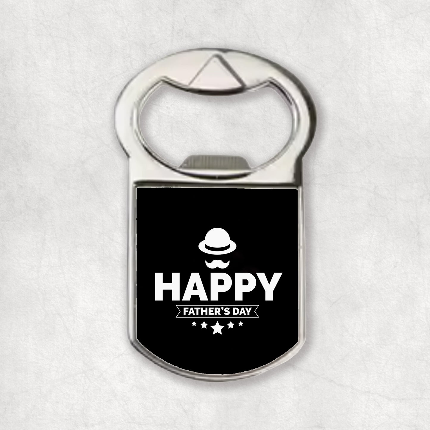 A bottle opener magnet with the 'Happy Father's Day' text and a father's icon on a black background.