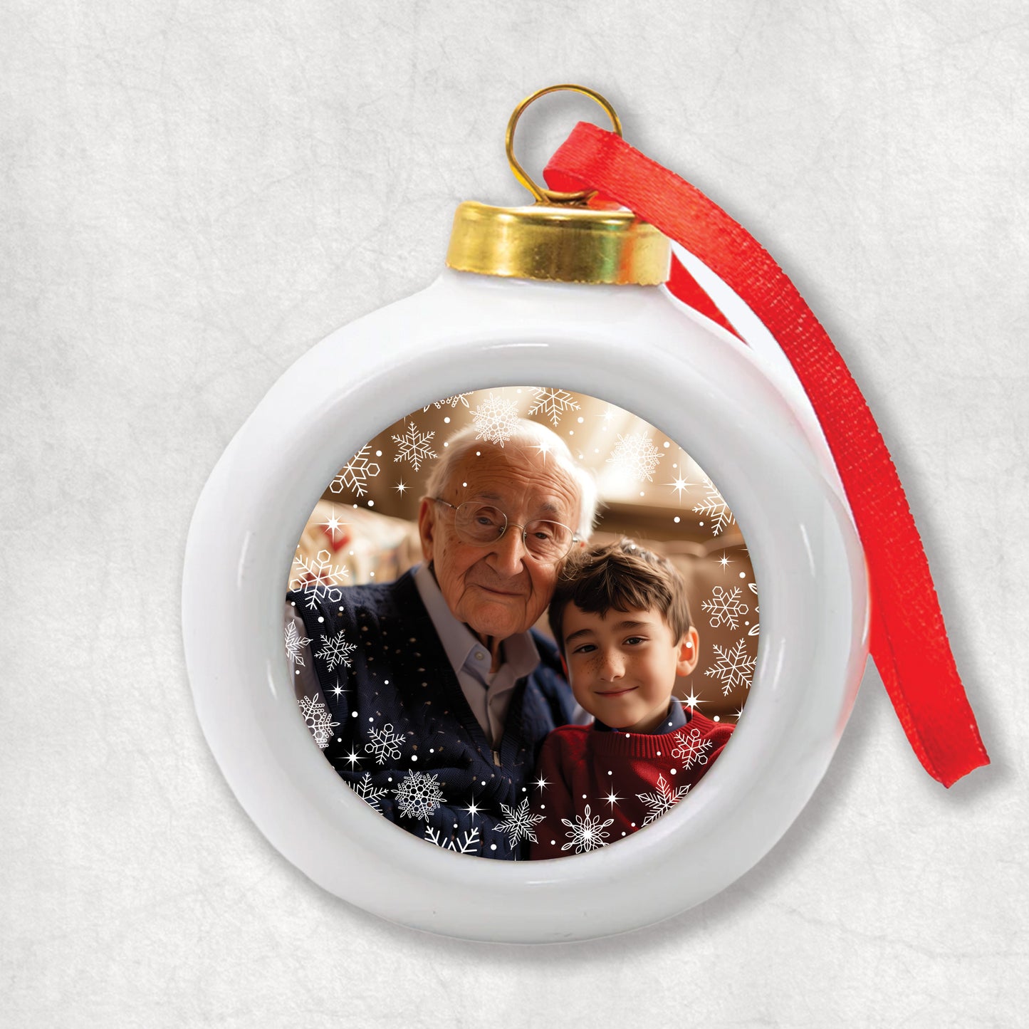 Personalised 3D ceramic Christmas Bauble with photo and beautiful white snowflakes around.