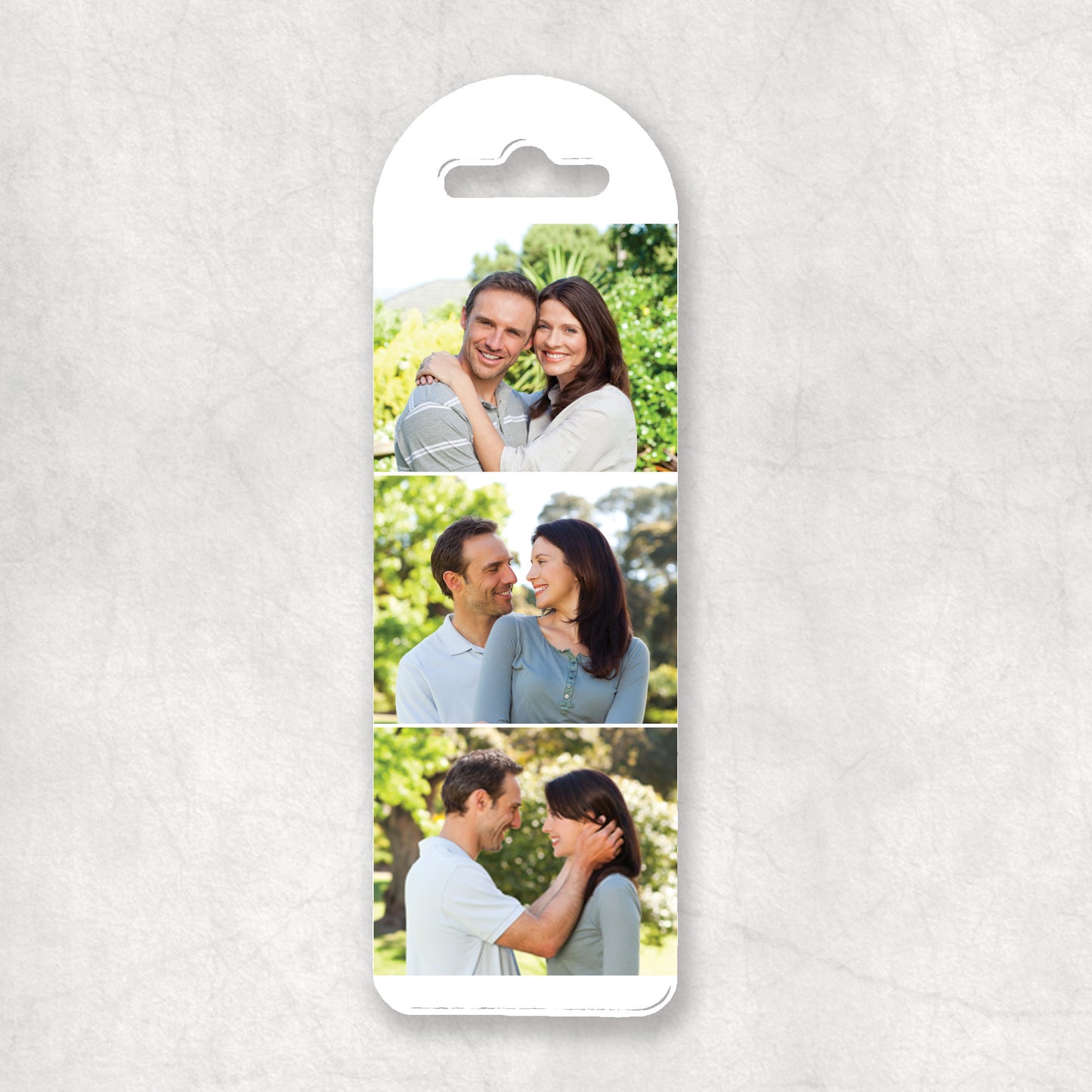 A personalised photo collage bookmark with three photos
displayed on a white background.