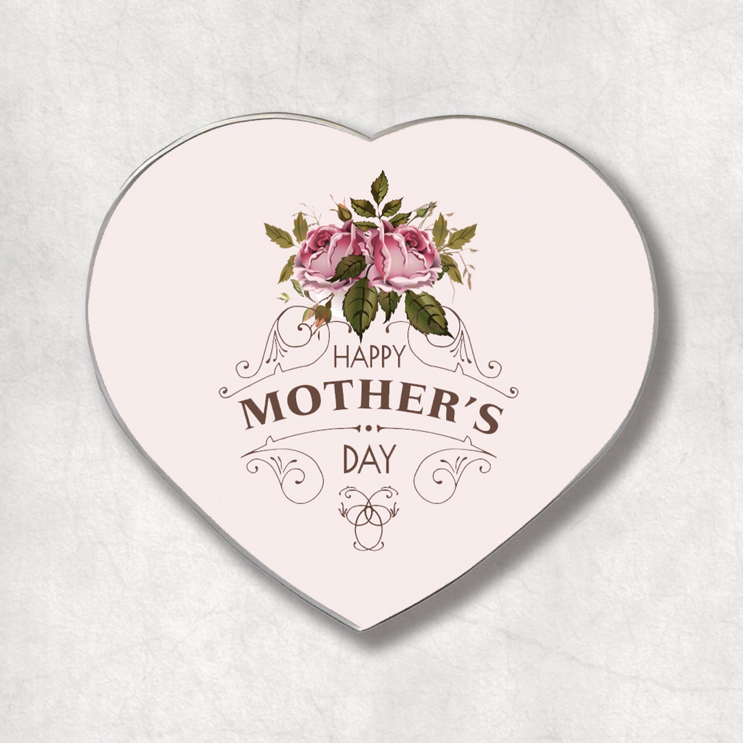 A heart-shaped metal magnet with a 'Happy Mother's Day' message and pink roses design on the white background.