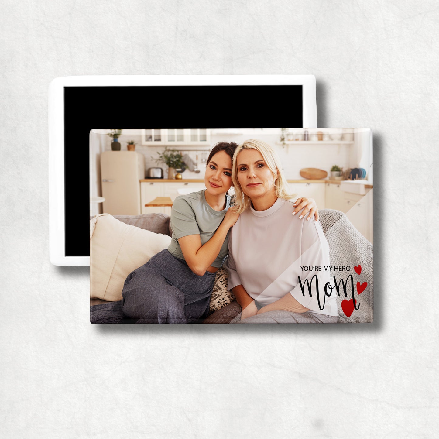 Personalised horizontal photo ceramic magnet with 'Mom you are my hero' text and three hearts in right bottom corner.