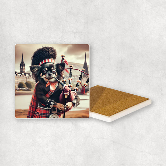 Ceramic Coaster gift with a Black Chihuahua dog design, dressed in traditional Scottish costume, playing the bagpipes, with Edinburgh in the background. 