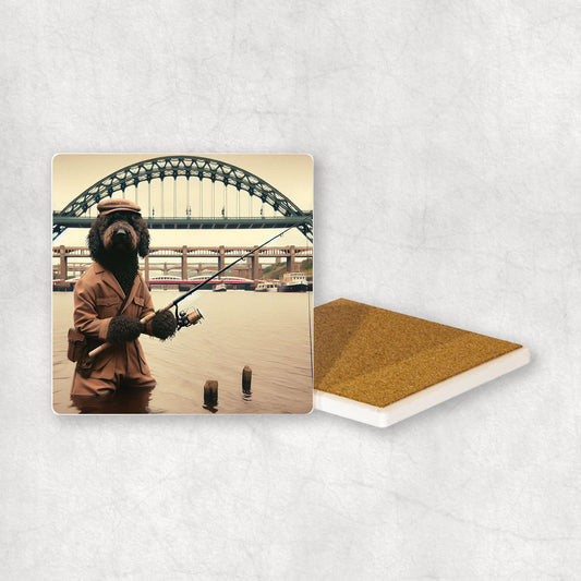 Ceramic Coaster gift with a Black Poodle dog design, dressed in an Angler costume, fishing in the Tyne river, with Newcastle bridges in the background.