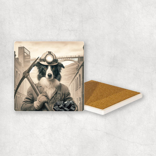 Ceramic Coaster gift with a Border Collie dog design, dressed like a miner with a pickaxe and coal in its paws, with a mine in the background.