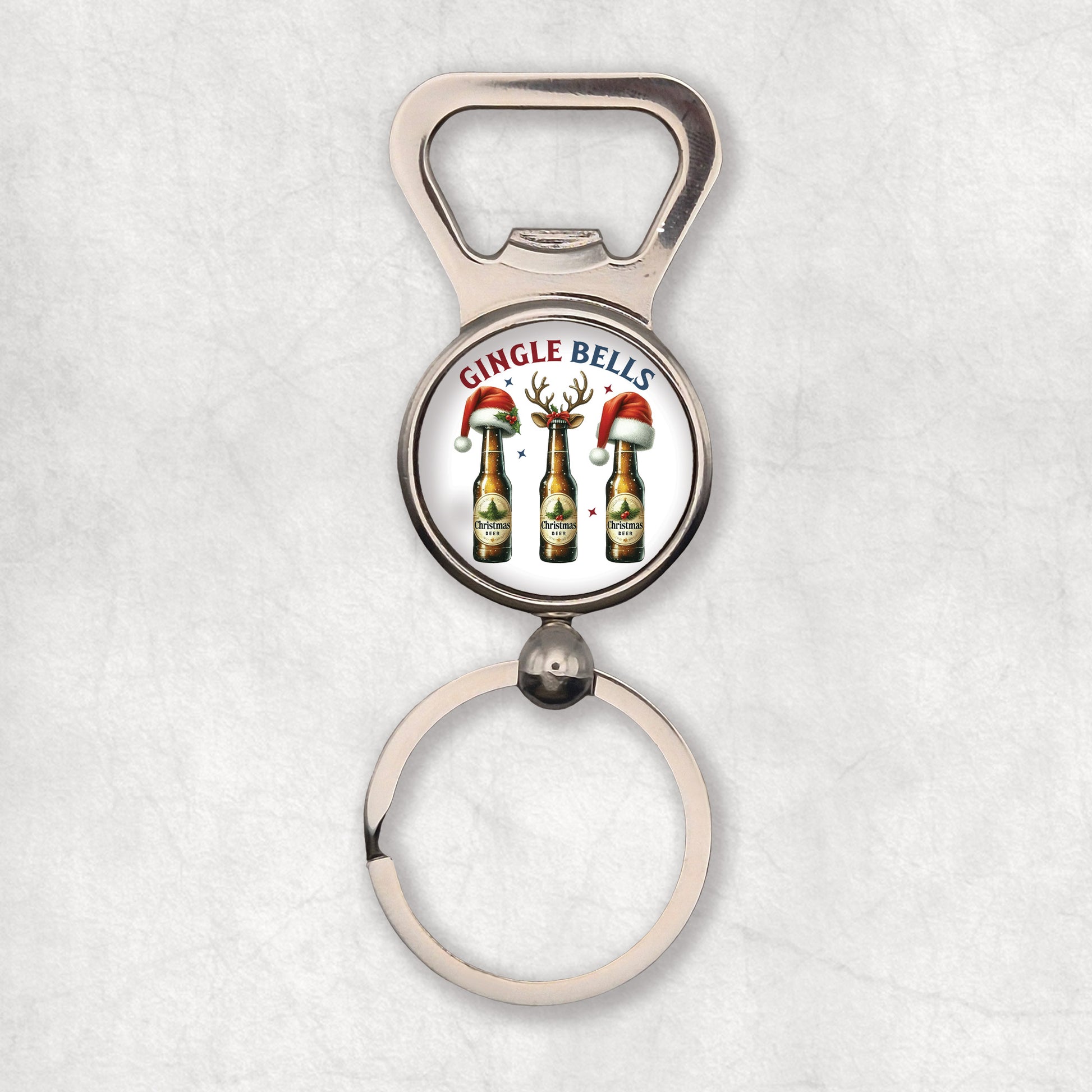 Bottle opener keyring with Christmas design presented tree beers with christmas hats and 'Gingle Bell' text on a white background.