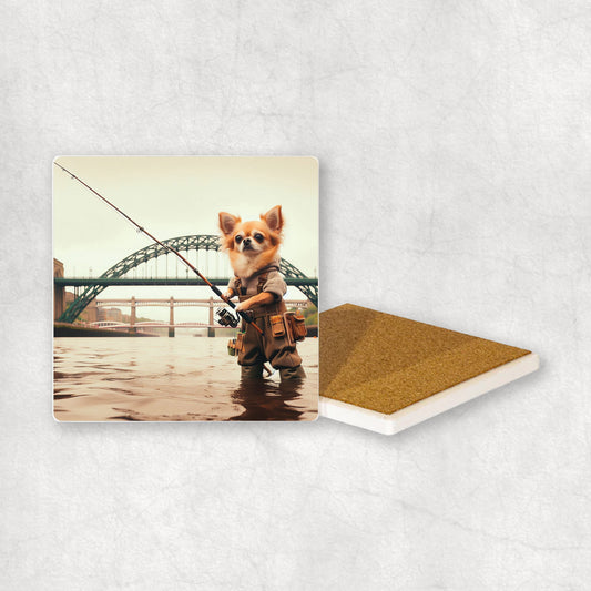 Ceramic Coaster gift with a Gold Chihuahua dog design, dressed in an Angler costume, fishing in the Tyne river, with Newcastle bridges in the background.