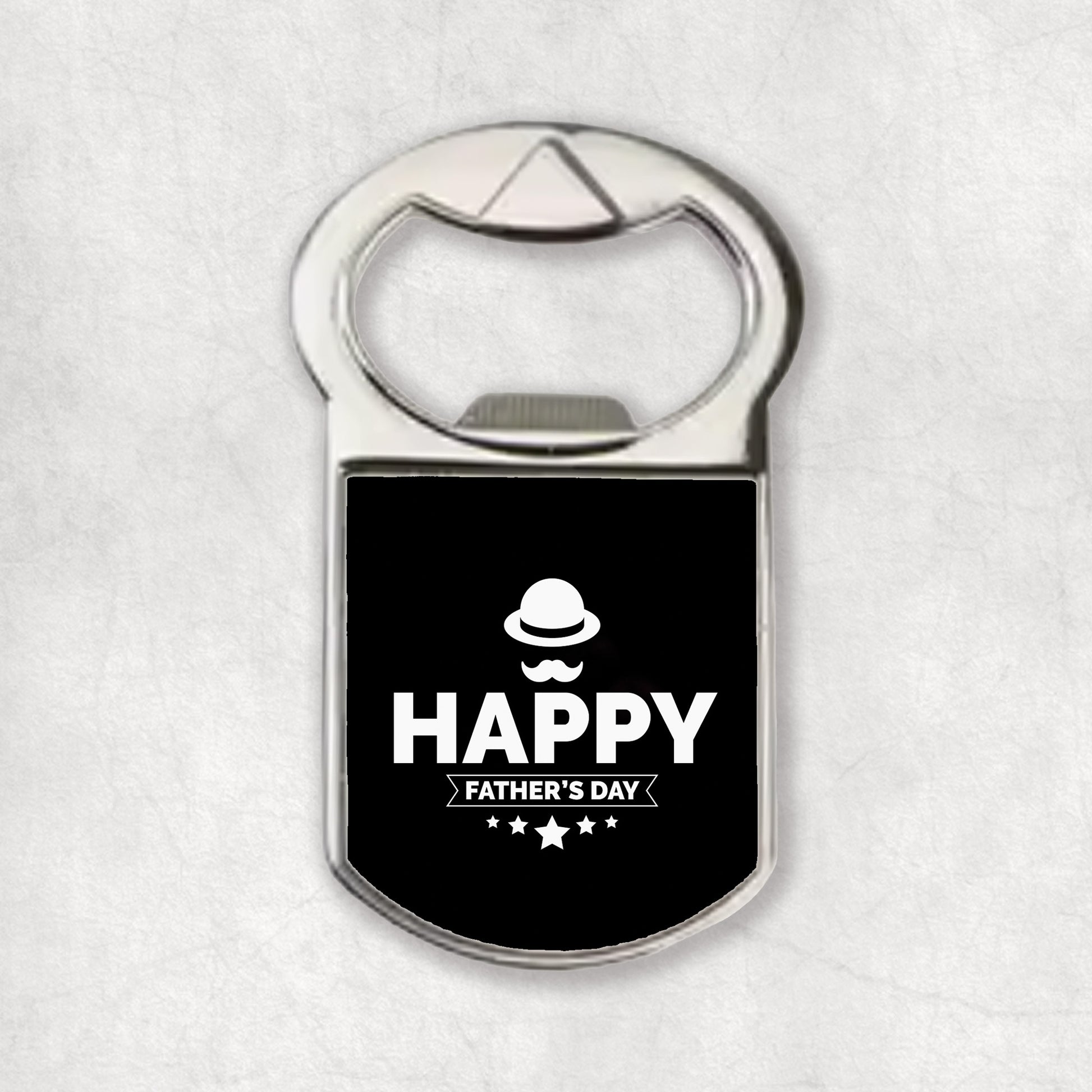 A bottle opener magnet with the 'Happy Father's Day' text and a father's icon on a black background.