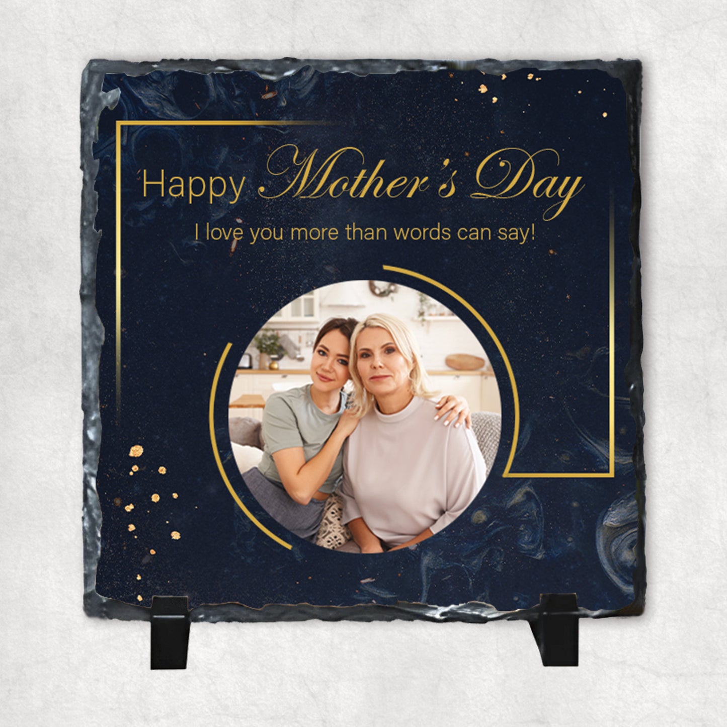 A personalized photo rock slate with a circular personalised photo and a Mother's Day message in gold lettering.