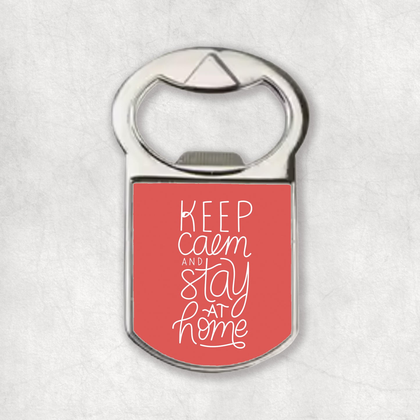 Bottle opener magnet with a special quote 'Keep calm and stay at home', the perfect gift for any occasion.