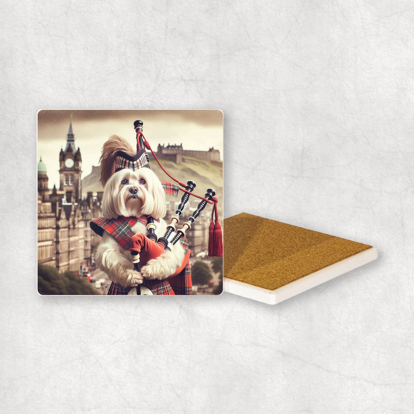 Ceramic Coaster gift with a Maltese dog design, dressed in traditional Scottish costume, playing the bagpipes, with Edinburgh in the background. 