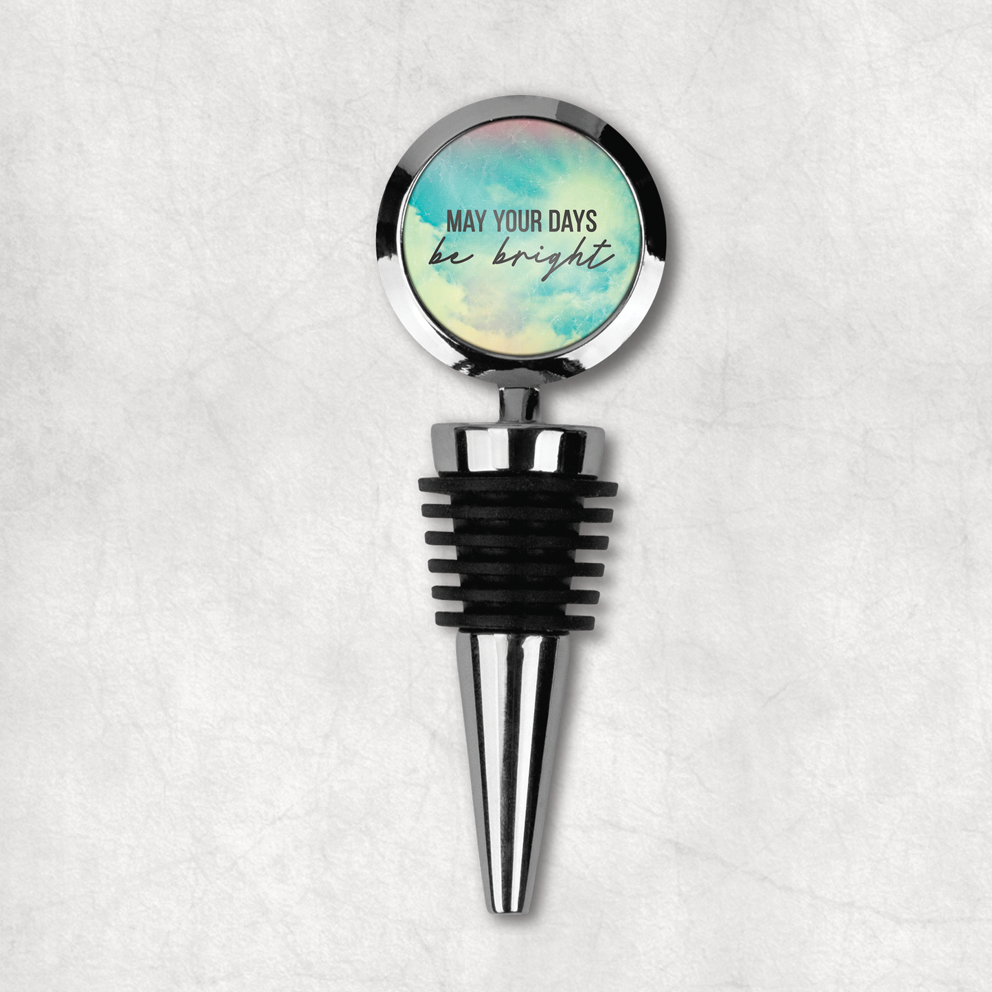 Stylish wine stopper with 'May your days be bright' inspirational phrase on white and blue background, the perfect gift for wine lover