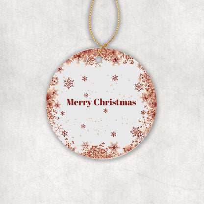 Personalised ceramic Christmas tree ornament with 'Merry Christmas' text and red snowflakes design on a white background.