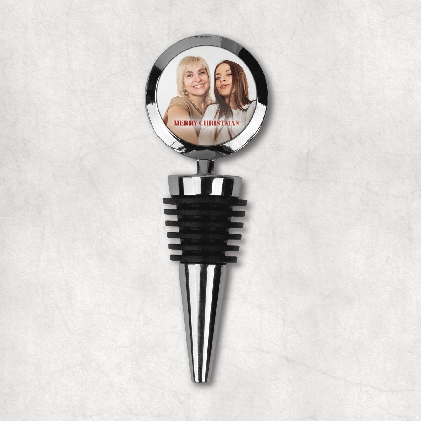 Personalised wine bottle stopper, with MrryChristmas elegant text, the perfect gift for Christmas. 
