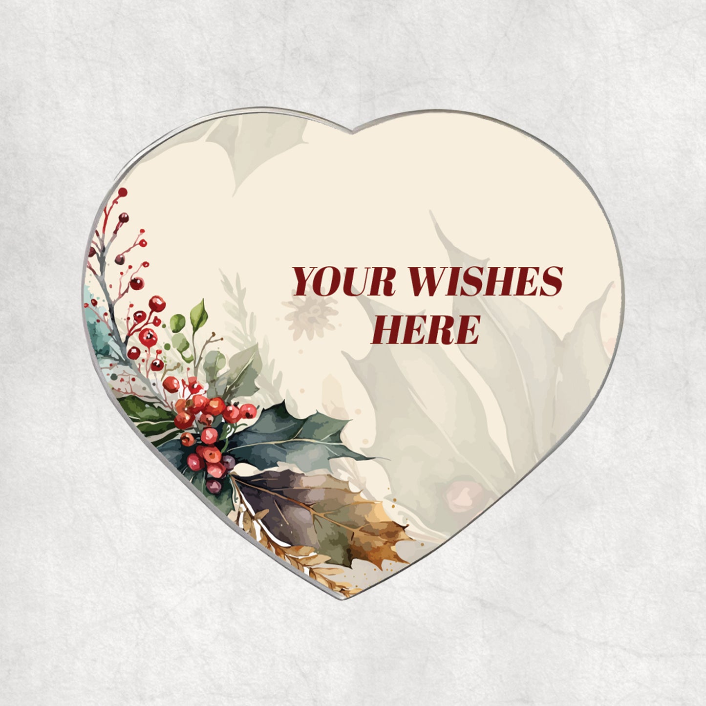 Personalised heart-shaped magnet with custom Christmas wishes printed on a light Christmas, flowery background.