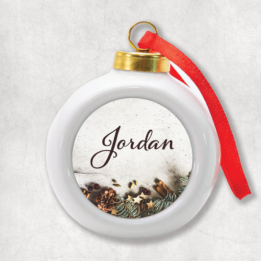 3D Ceramic personalised Christmas bauble with your name on the Christmas background.
