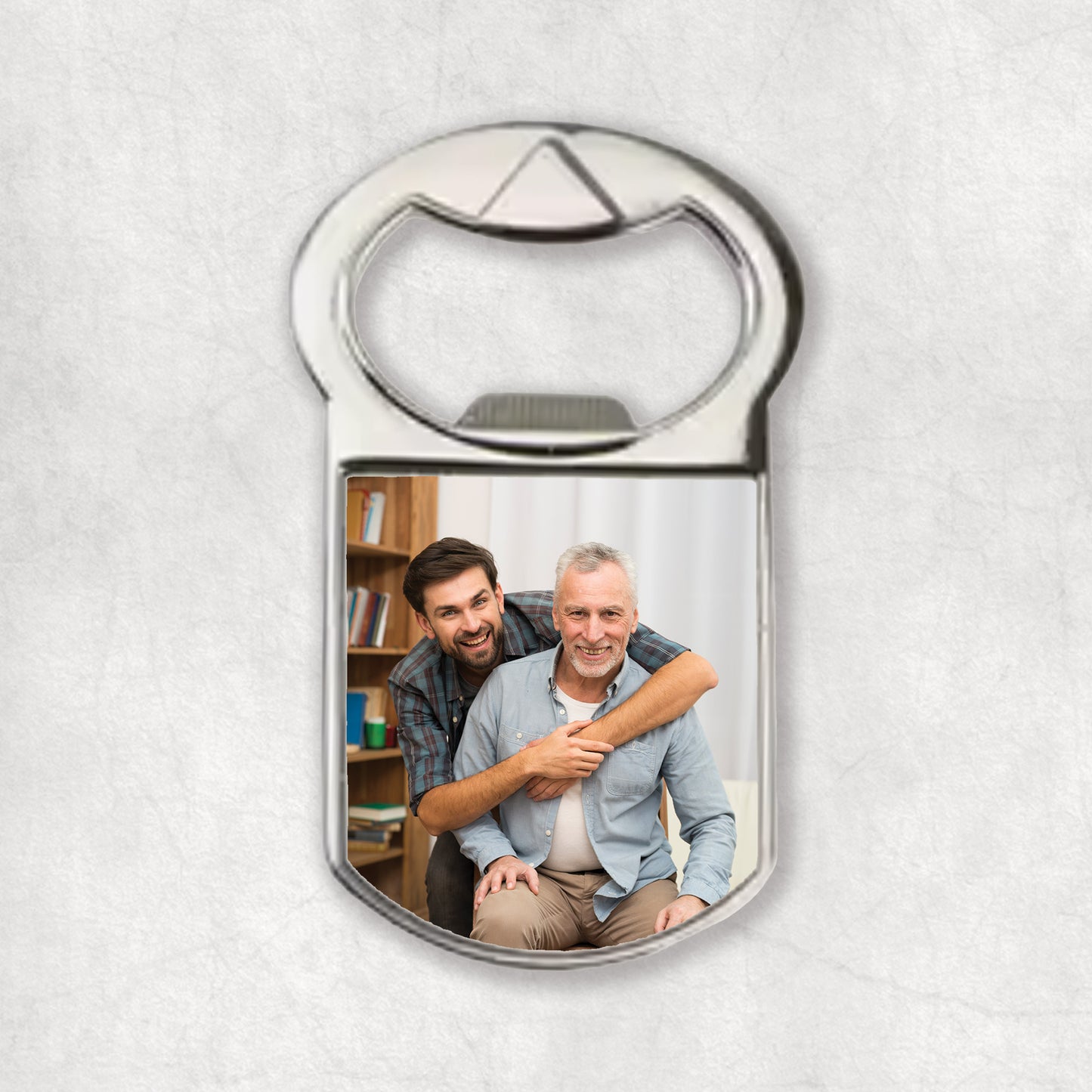 A bottle opener magnet with a personalised photo printed on it.