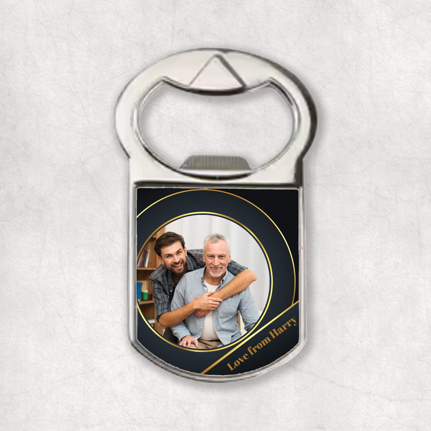 A bottle opener magnet with a personalised photo print, and text space for a name on an elegant dark and gols background.