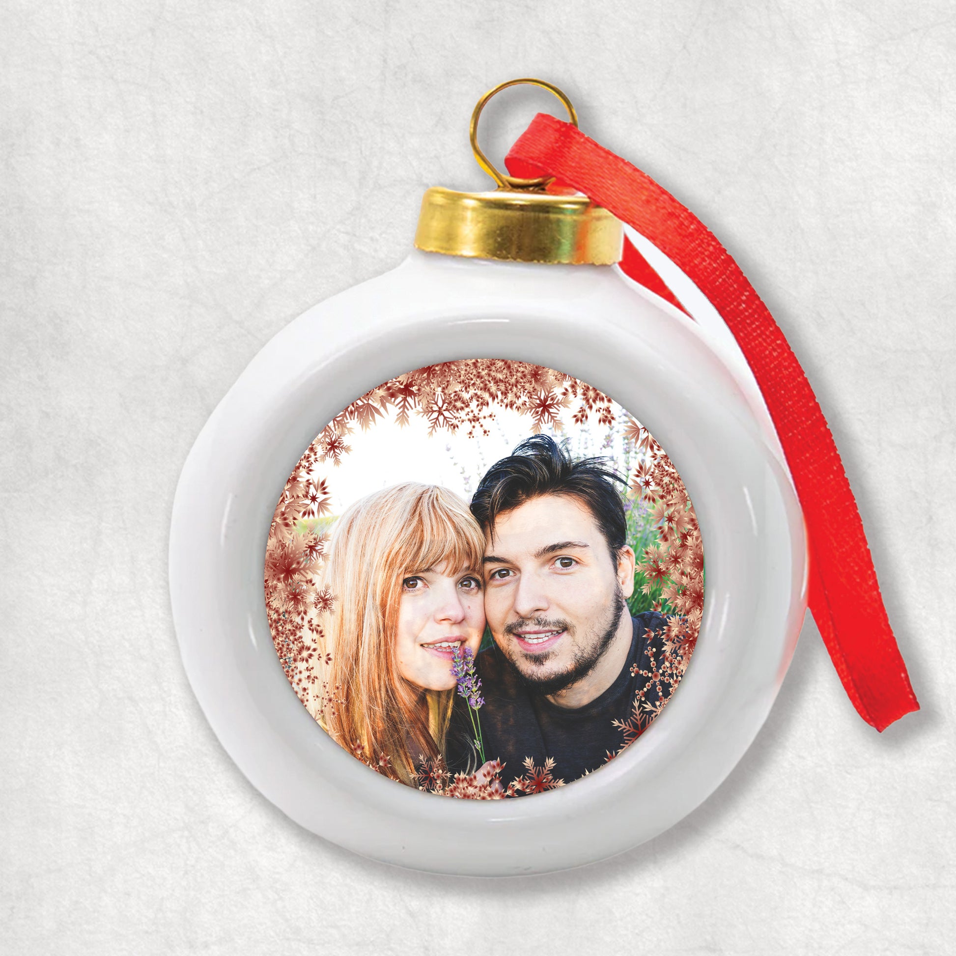 3D Ceramic Christmas Bauble with Personalised Photo and red snowflakes around. 