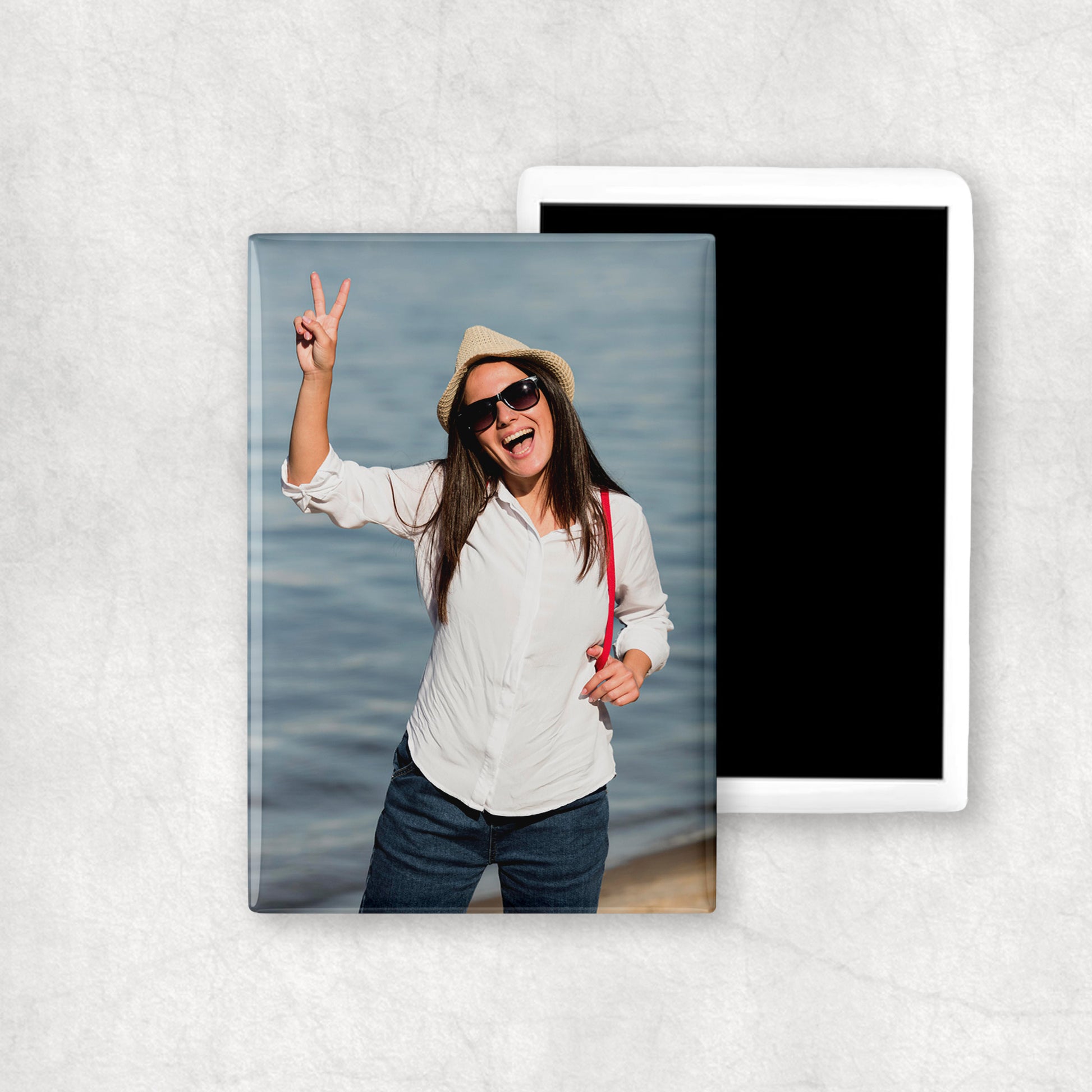 A personalised ceramic magnet with a vertical photo print, perfect gift for any ocasion.