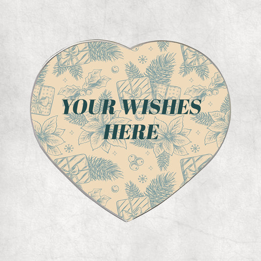 Personalised heart-shaped metal magnet with a custom wishes printed on festive background.
