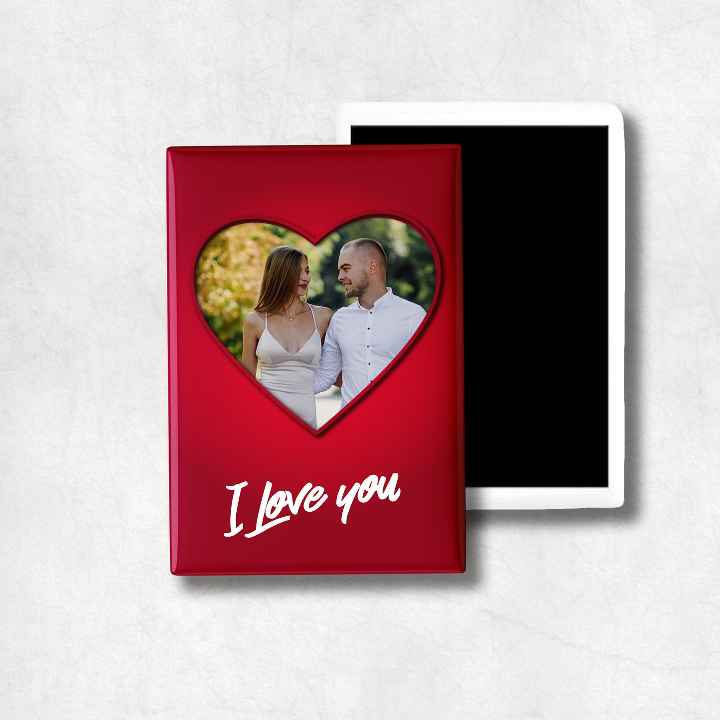 Vertical ceramic magnet wit a red heart-shaped personalised photo and 'I Love You' white text on a red background.
