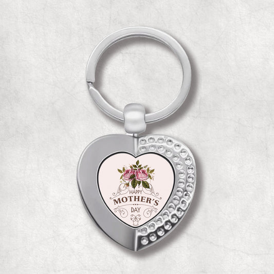 An elegant heart-shaped keyring with a pink rose design and the text 'Happy Mother's Day' on it.