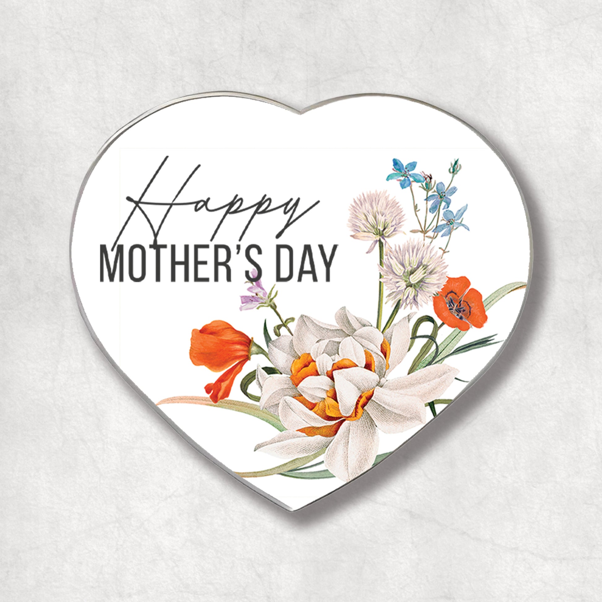 A heart-shaped metal magnet with a floral design and the text 'Happy Mother's Day' on the white background.