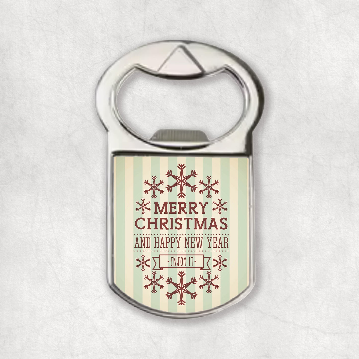 Bottle opener with Christmas design, snowflakes and christmas wishes on a light background.
