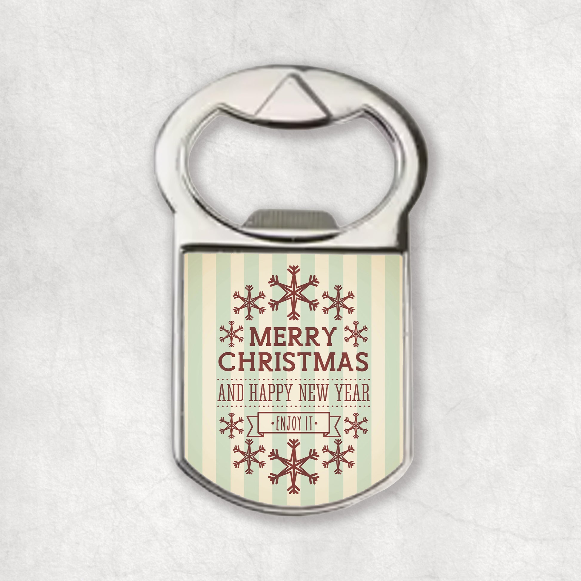 Bottle opener with Christmas design, snowflakes and christmas wishes on a light background.