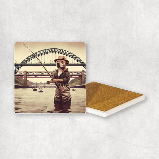 Ceramic Coaster gift with a Staffordshire Bull Terrier dog design, dressed in an Angler costume, fishing in the Tyne river, with Newcastle bridges in the background.