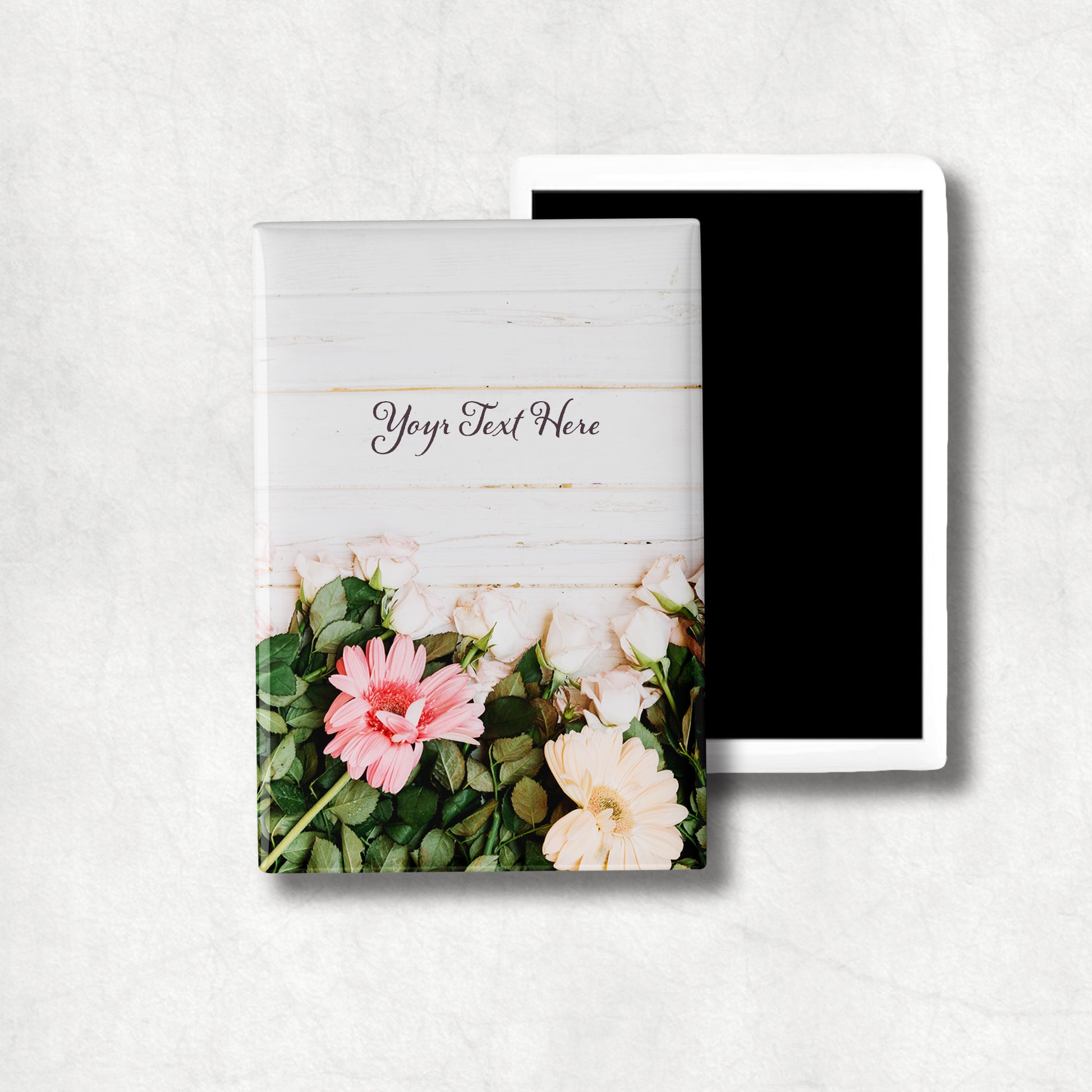 A vertical ceramic magnet with a floral design at the bottom and your personalised text in the middle, the perfect gift for Mother's Day. 