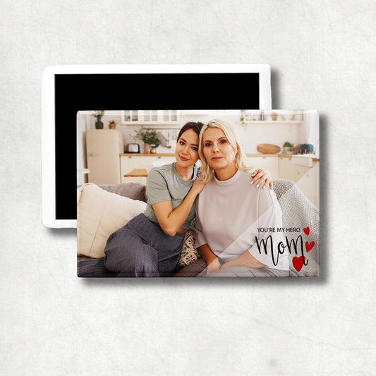 Personalised horizontal photo ceramic magnet with 'Mom you are my hero' text and three hearts in right bottom corner.  