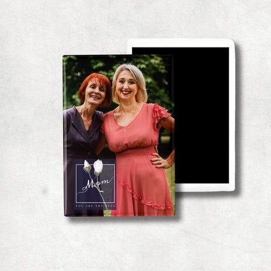 A personalised vertical ceramic magnet with a photo print and text that reads 'Mom You Are The Best'.